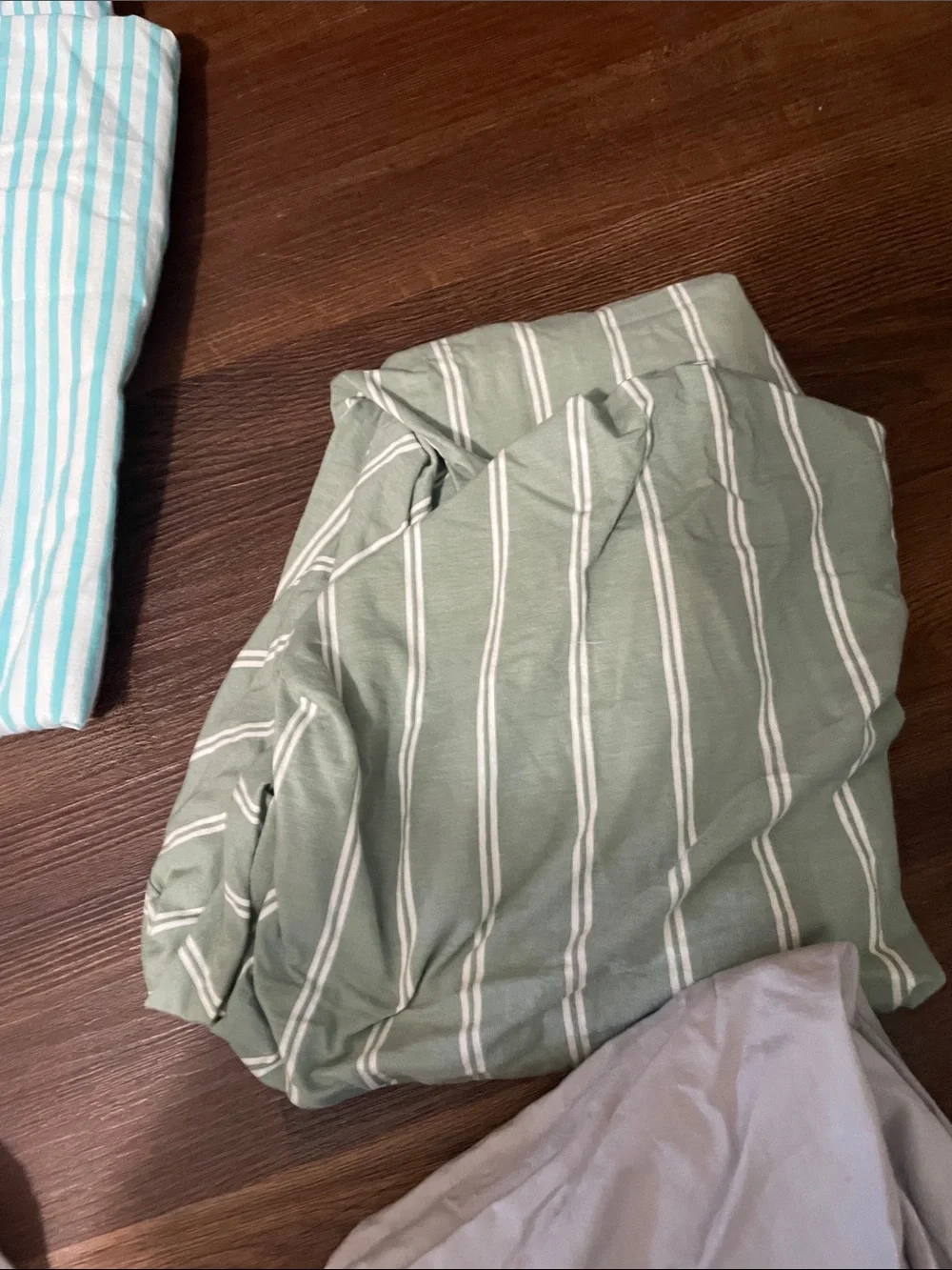 Neutral Taupe Sheet Set with Woodland Print Muslin Swaddle and Striped Linens